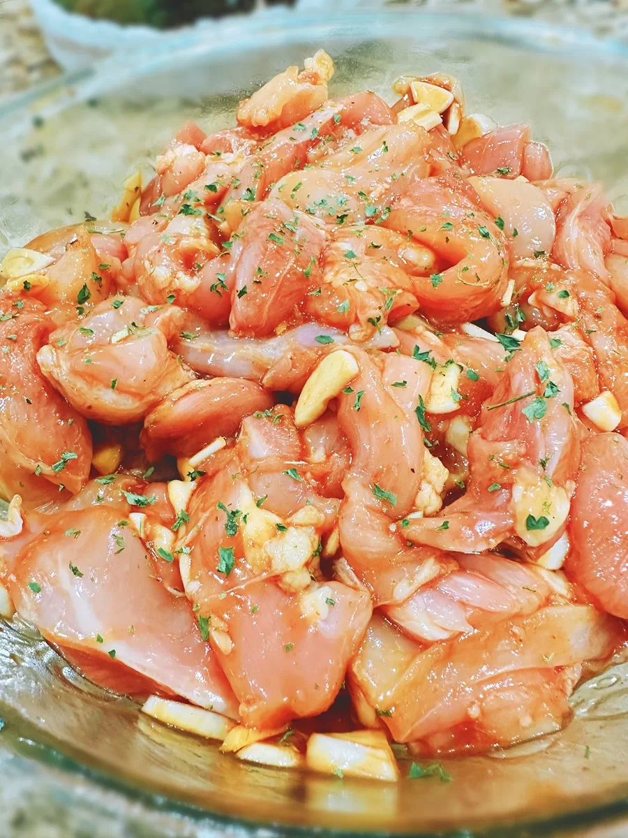 Raw chicken marinating in chinese teriyaki marinade