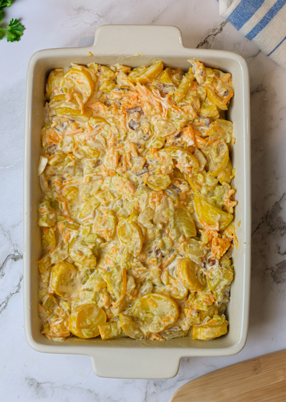 southern squash casserole in porcelain dish without cracker topping
