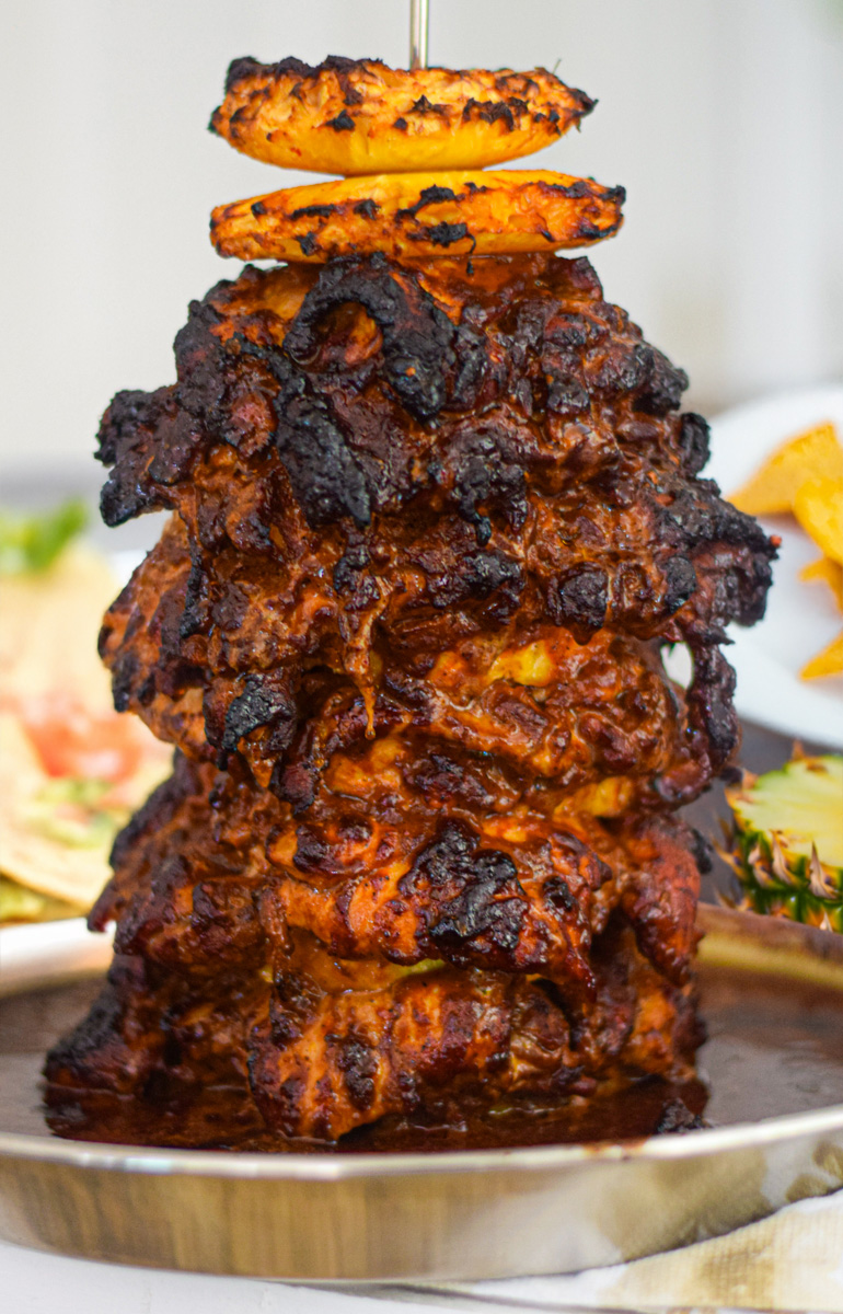 chicken al pastor on a skewer