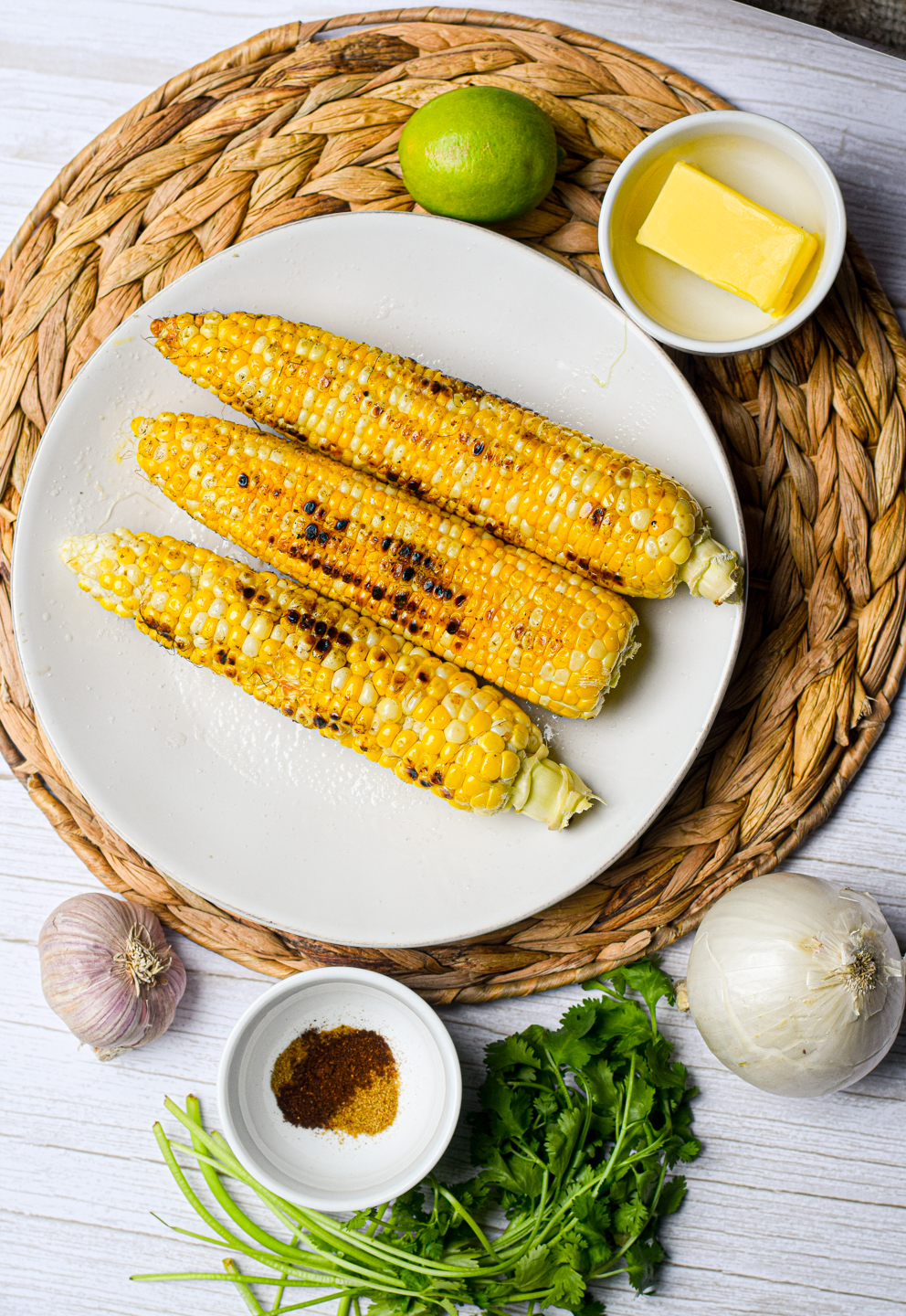 grilled charred corn on a plate